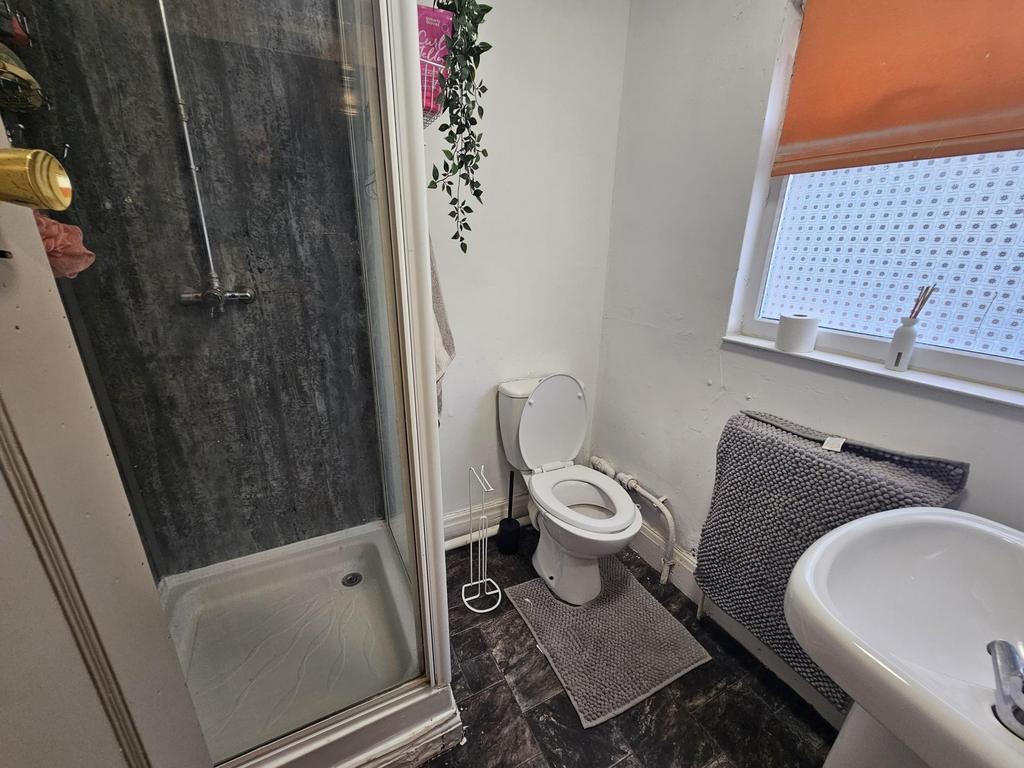 A clean and well-maintained bathroom featuring ...