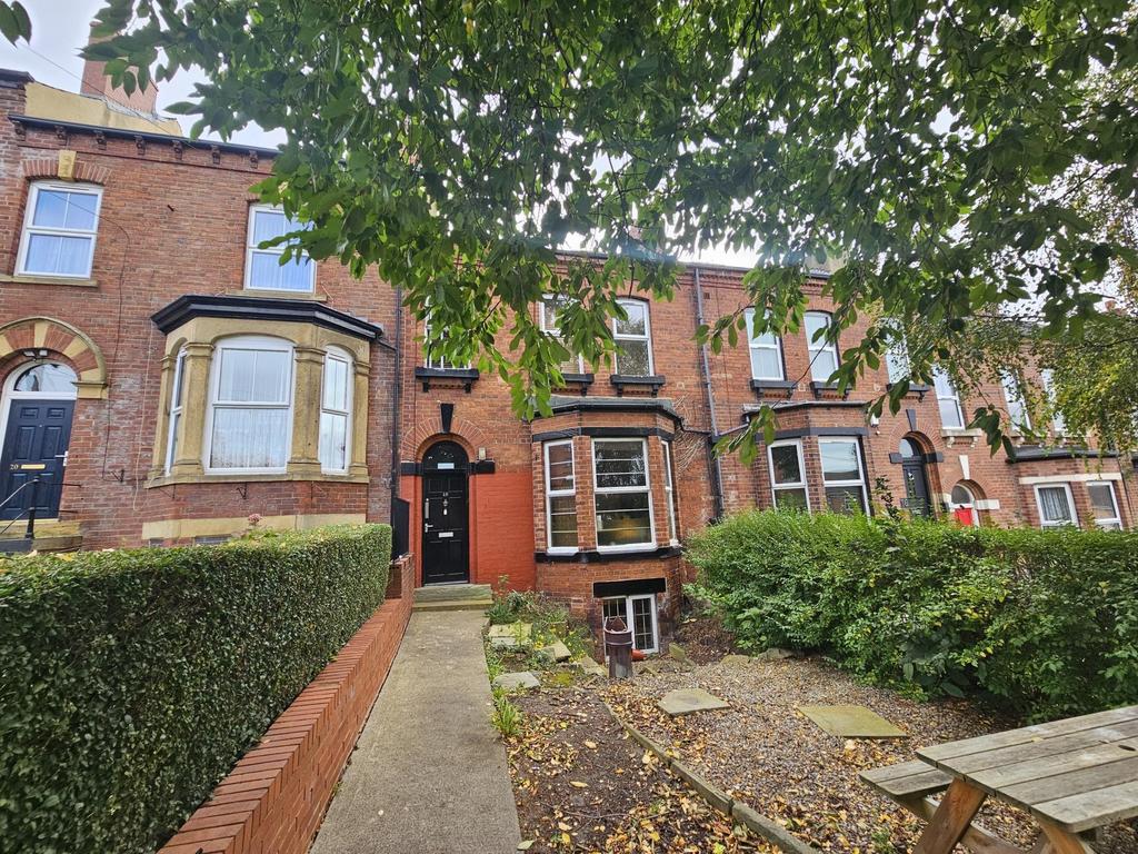 Charming front exterior of a traditional terrac...