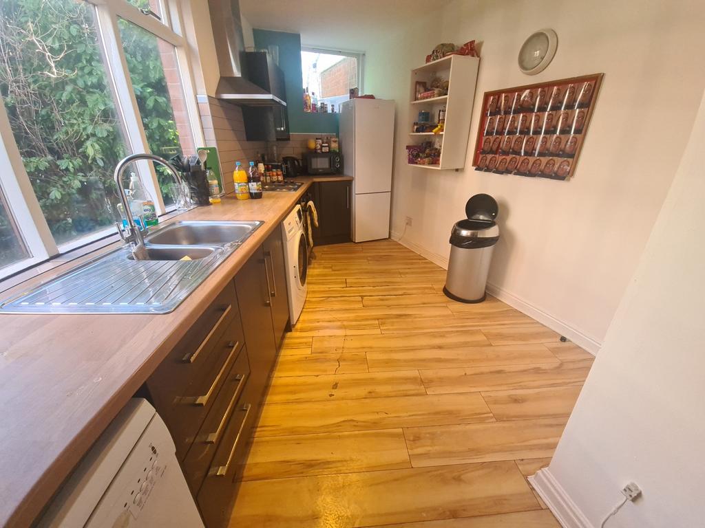 A bright and well-maintained kitchen featuring ...