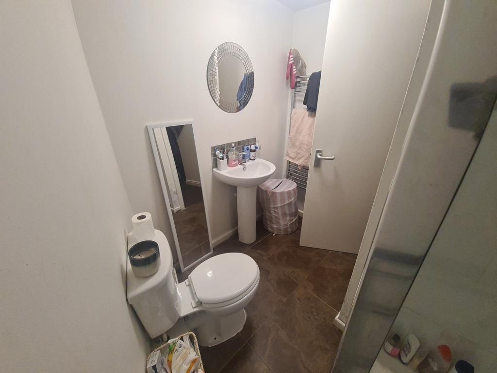 A clean and well-maintained bathroom featuring ...