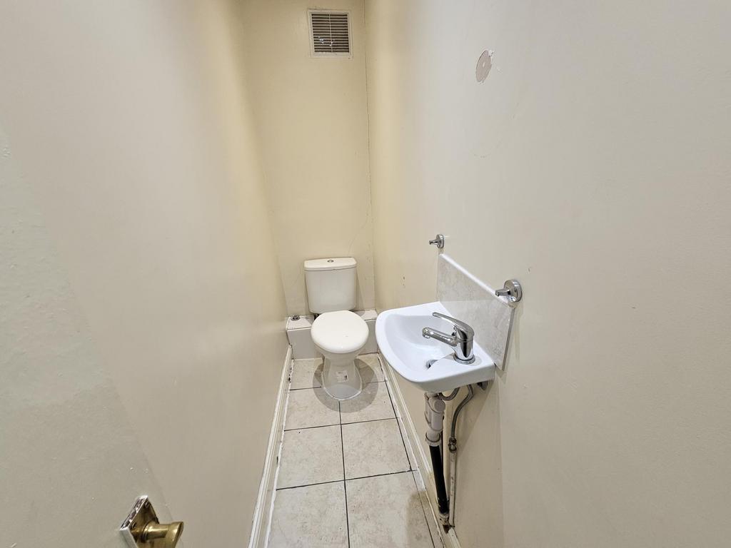 A clean and functional bathroom featuring a toi...