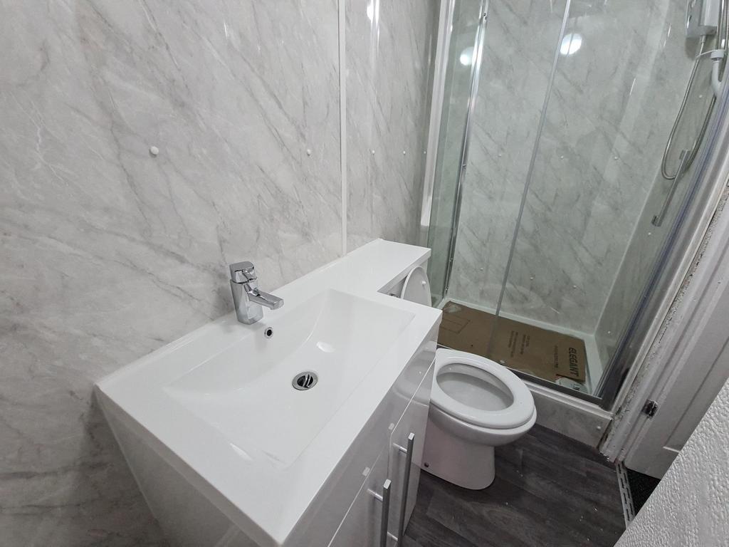 A clean and well-maintained bathroom with a mod...