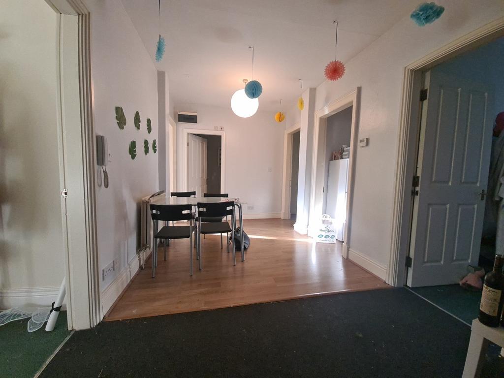 A spacious and welcoming living area with ample...
