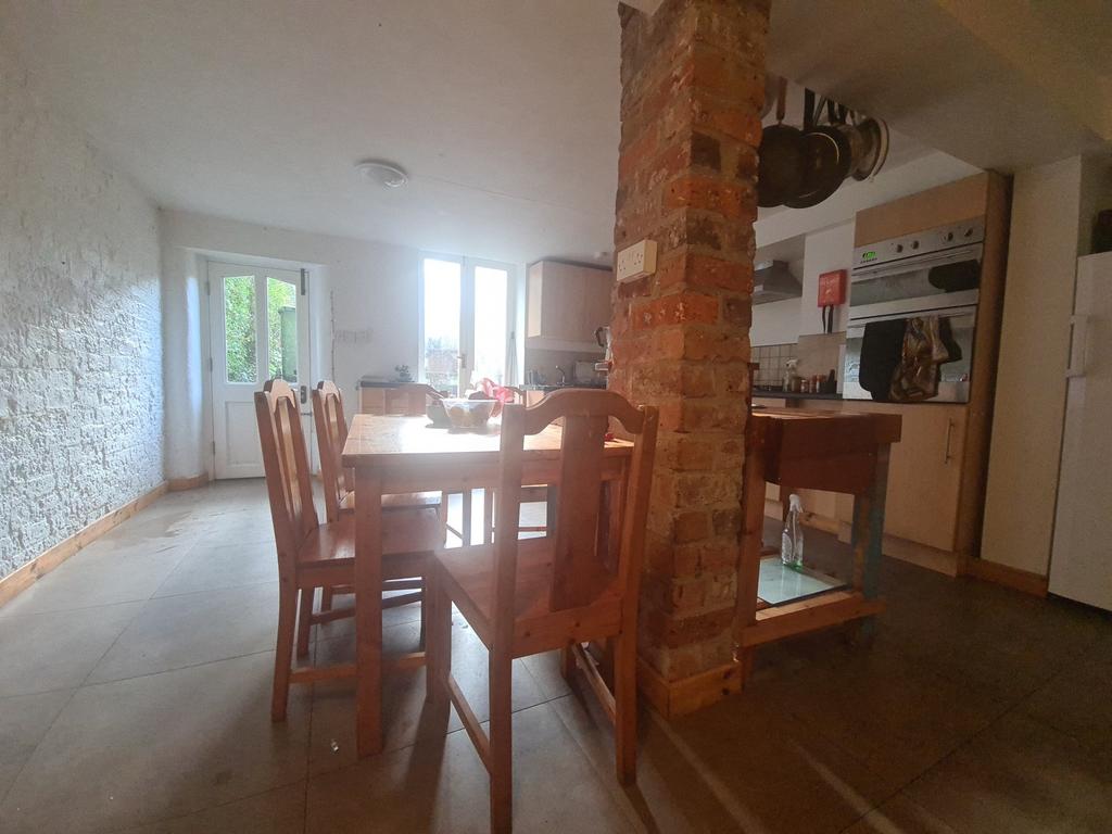 A spacious and bright living area with ample na...