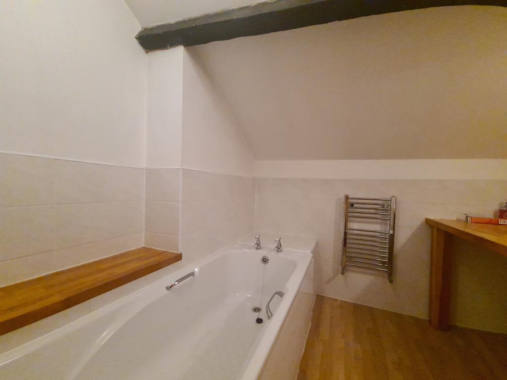 A clean and well-maintained bathroom with a mod...