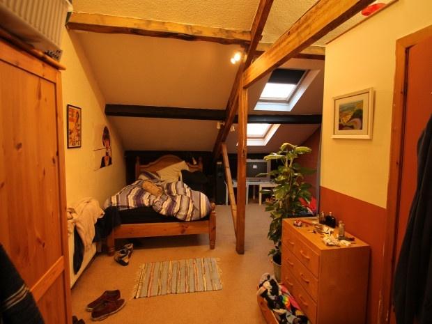 A compact bathroom area featuring a small WC wi...