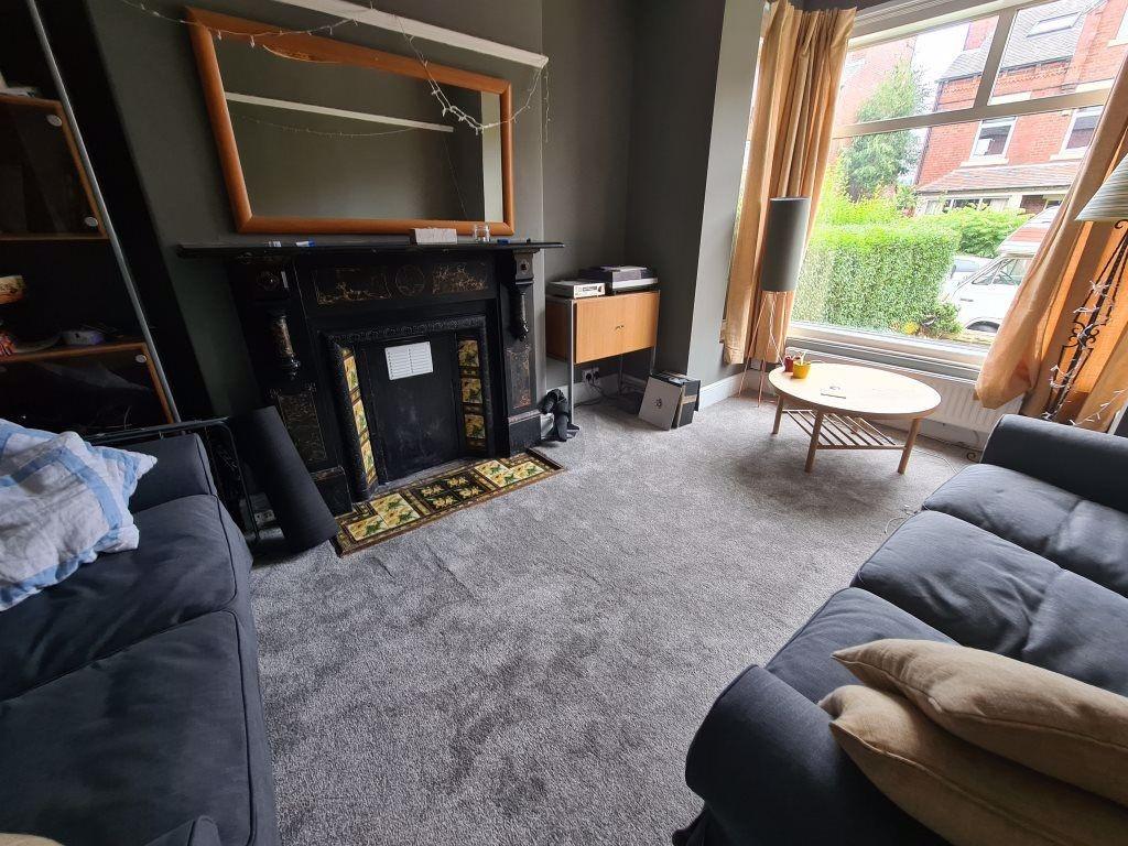 A cozy living room featuring comfortable sofas ...