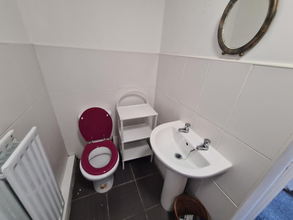 A clean and well-maintained bathroom featuring ...