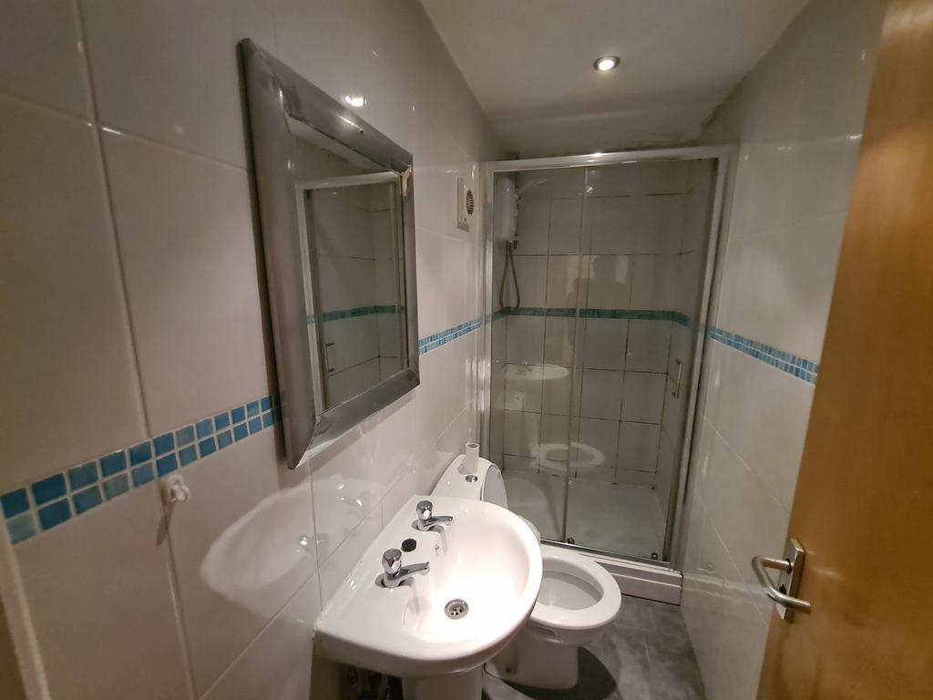 A clean and well-maintained bathroom featuring ...