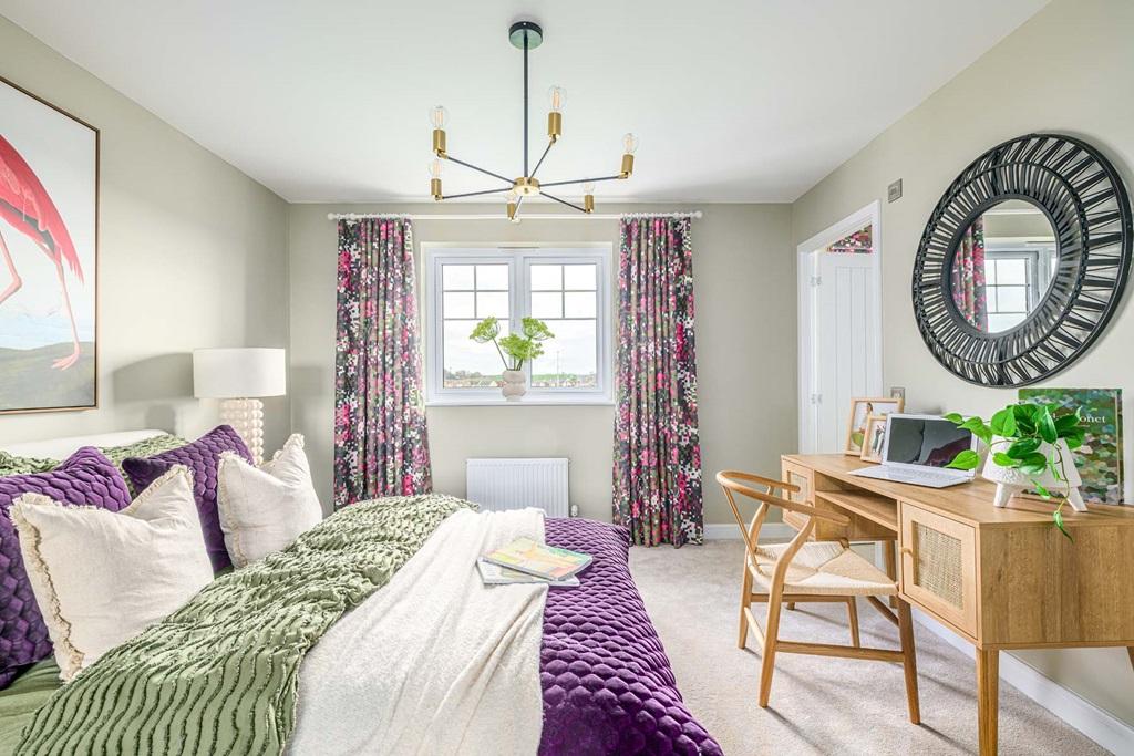 Bedroom 2 benefits from an en suite