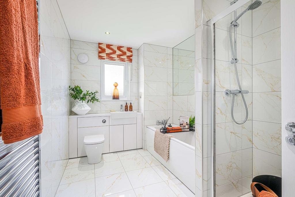 Family bathroom with bath and shower