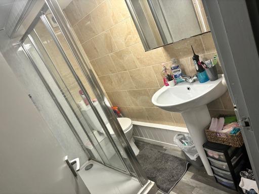 A clean and well-maintained bathroom with a lar...