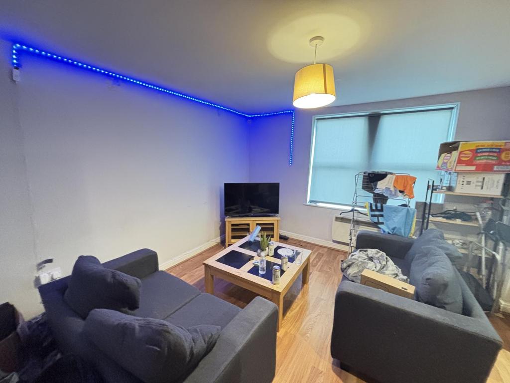 A modern and cozy living room with comfortable ...