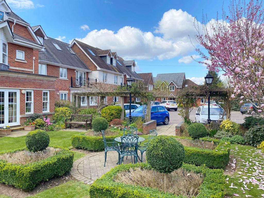 Street scene with property, garden