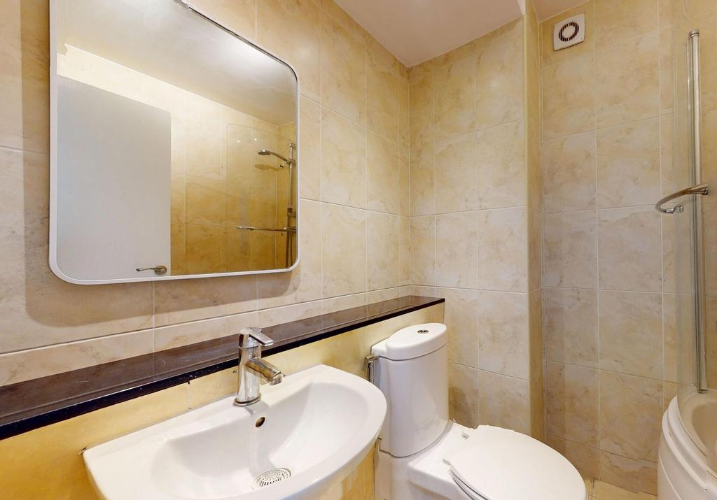 Modern bathroom featuring a clean sink with a l...