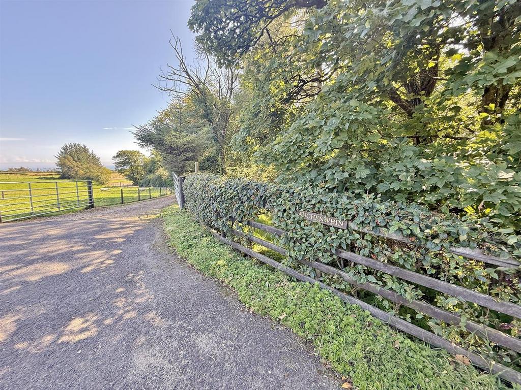 Auchenwhin sign and driveway from the main road