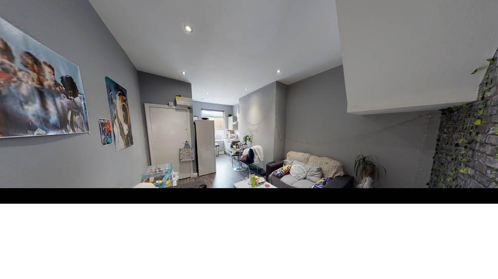 A spacious living room with ample natural light...