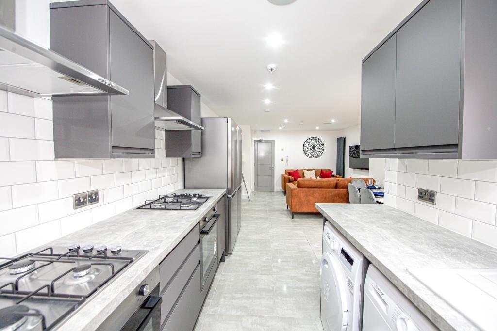 Modern, bright kitchen with ample counter space...