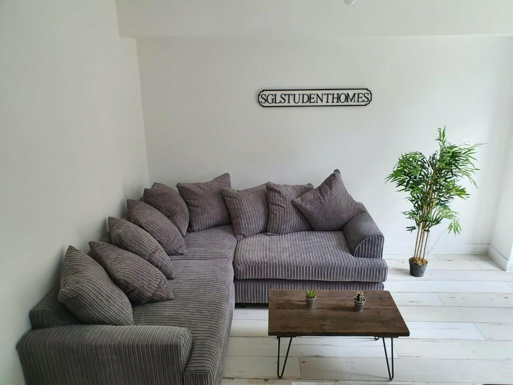 A modern and inviting living room featuring a l...
