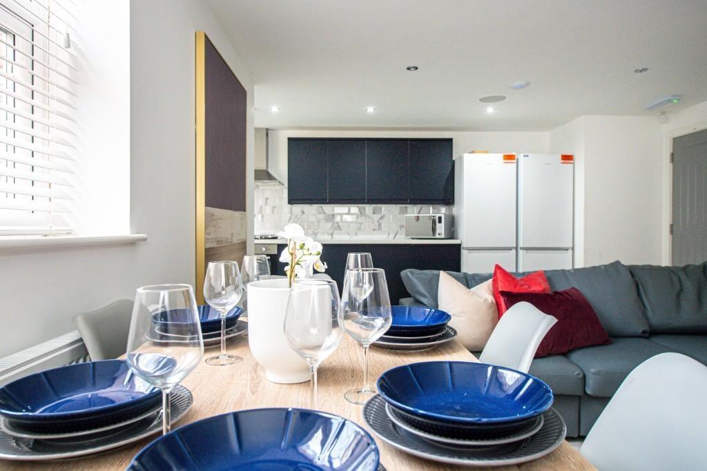 A modern and inviting living room featuring a s...