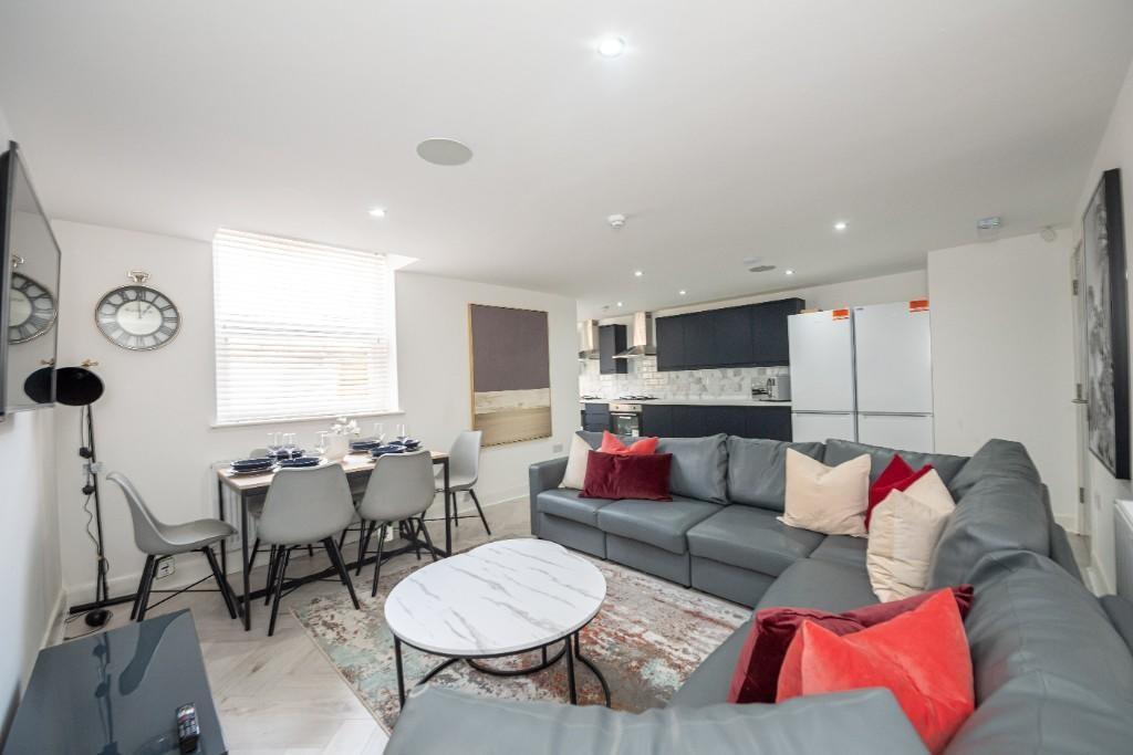 Bright and spacious contemporary living room wi...