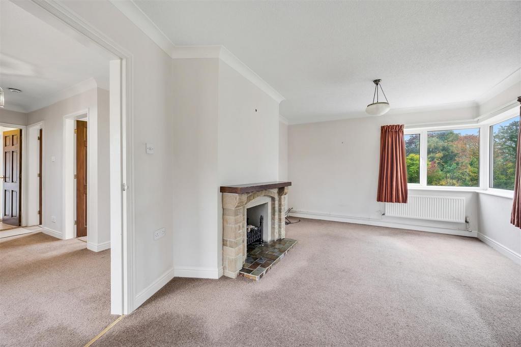 Sitting Room to window and hallway.jpg