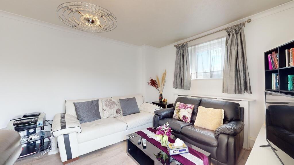 Bright and welcoming living room featuring two ...