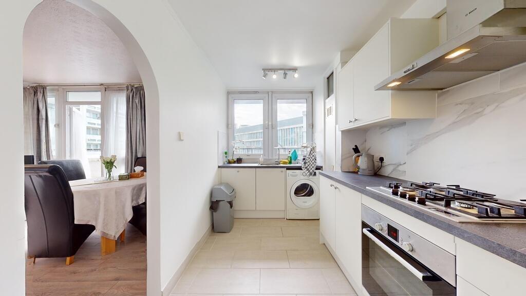 Modern and bright kitchen with ample natural li...