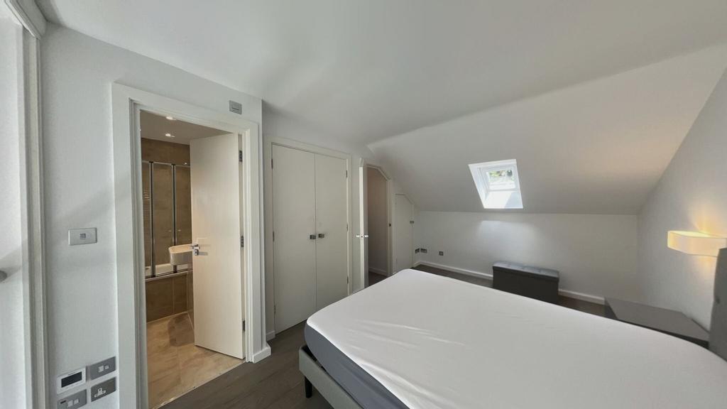 Bright and airy bedroom with a clean, minimalis...