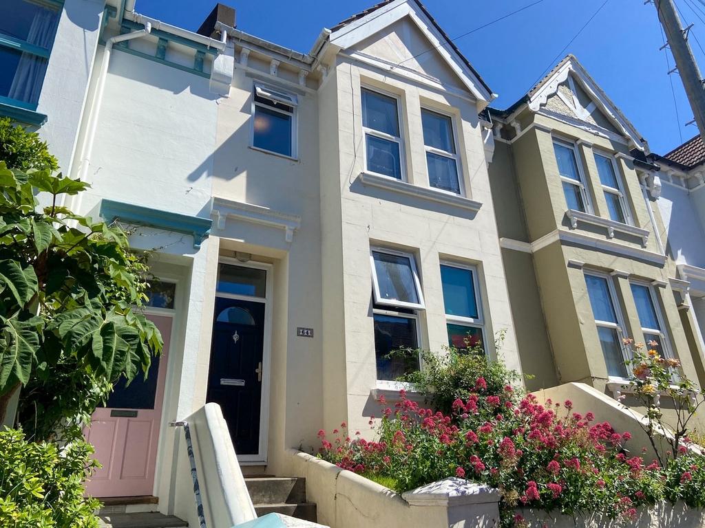 Bright, attractive terraced house frontage with...