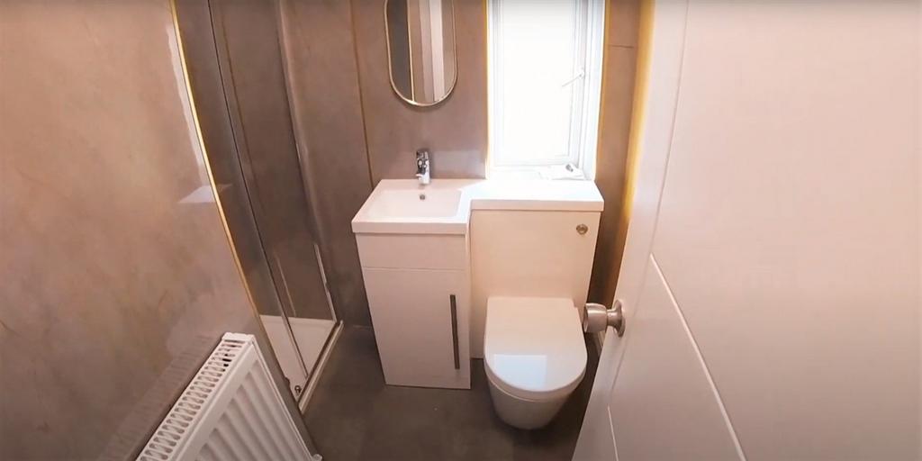 A clean and well-maintained bathroom featuring ...