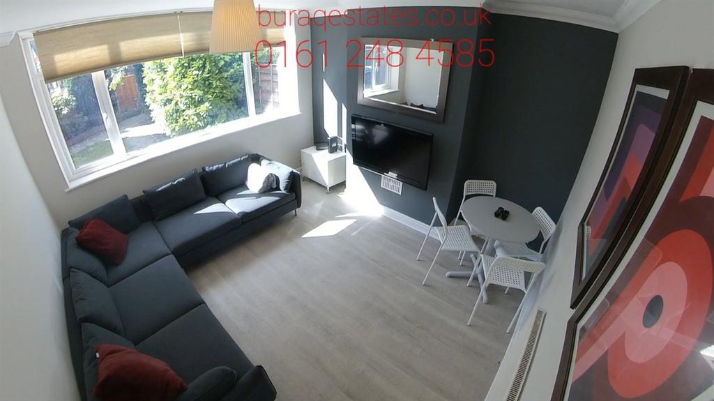 A bright and modern living room featuring a lar...