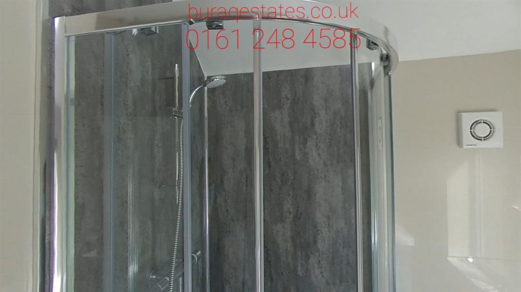 A well-maintained bathroom featuring a large sh...