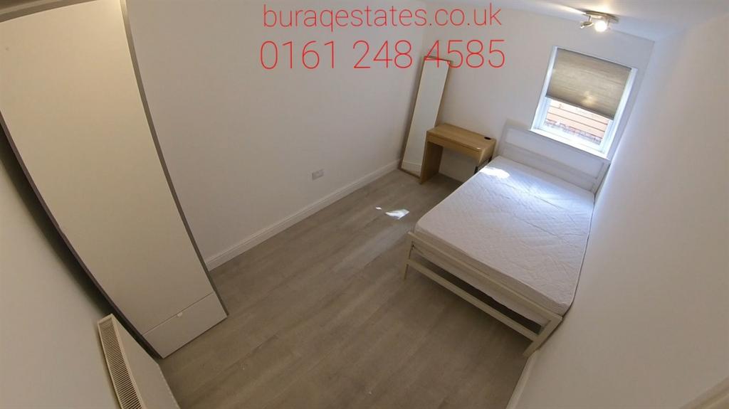 A clean, well-maintained small bathroom with ba...