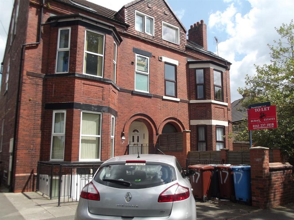 Attractive red-brick three-storey period proper...