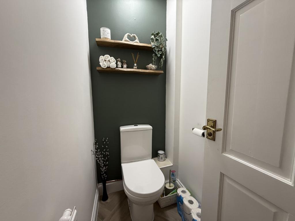 Cloak Room off
