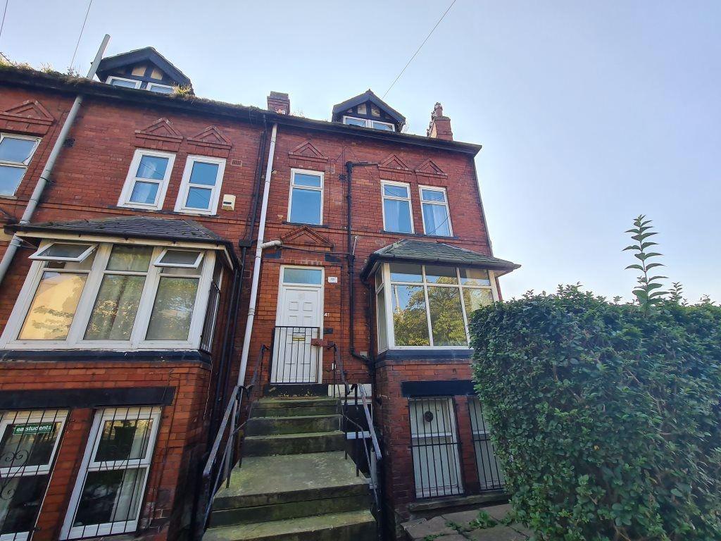 A charming front façade of a traditional brick ...