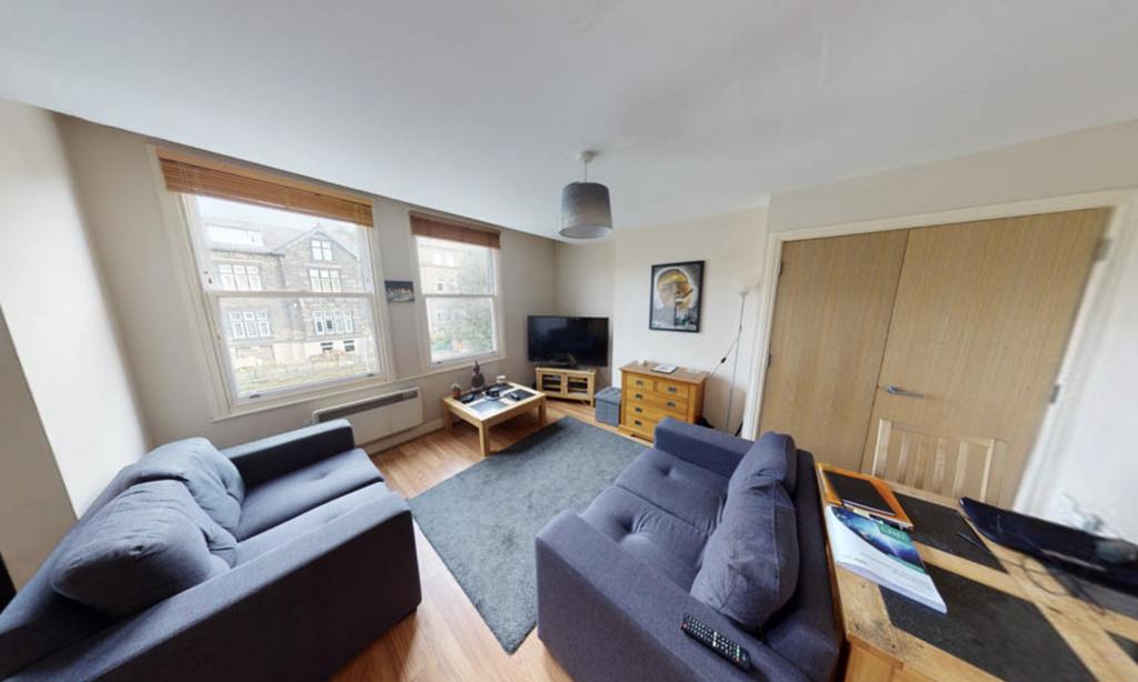 A spacious and inviting contemporary living roo...