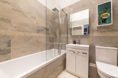 1 Burgess Mews, London, SW19 1UF