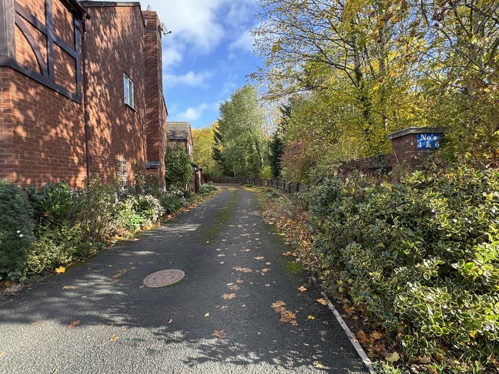 Drive leading to property