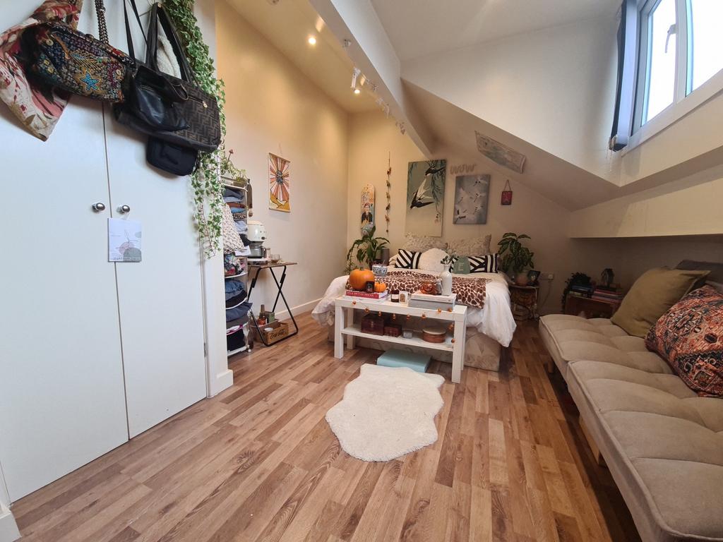 Bright and welcoming living room with natural l...
