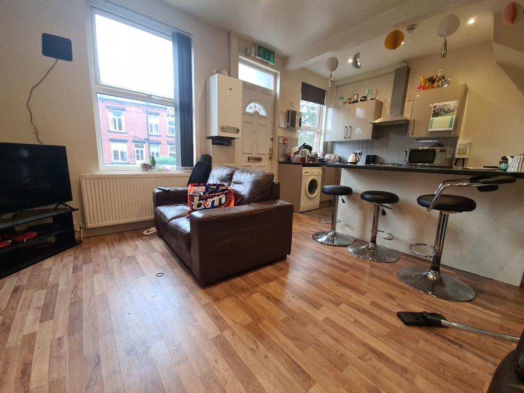 Bright and welcoming living room with large win...
