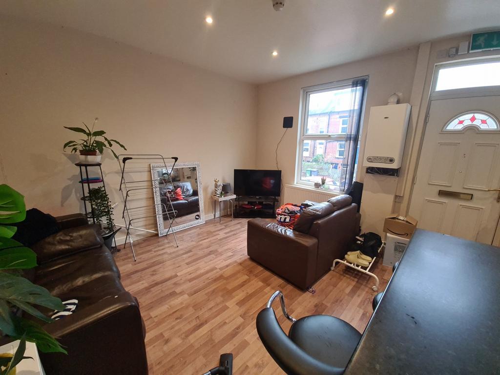 Bright and welcoming living room featuring a co...