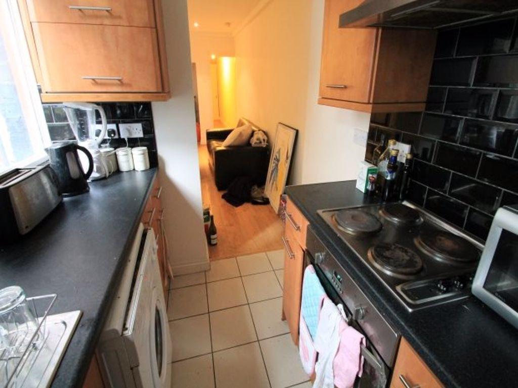 A well-maintained kitchen with ample counter sp...