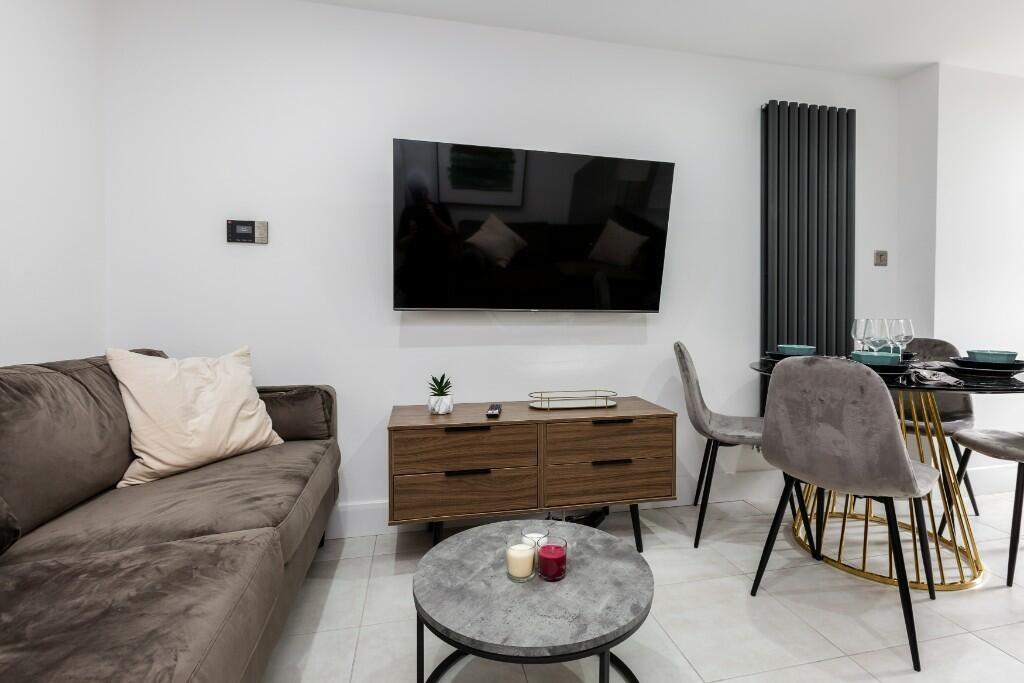 A modern and inviting living room featuring a l...