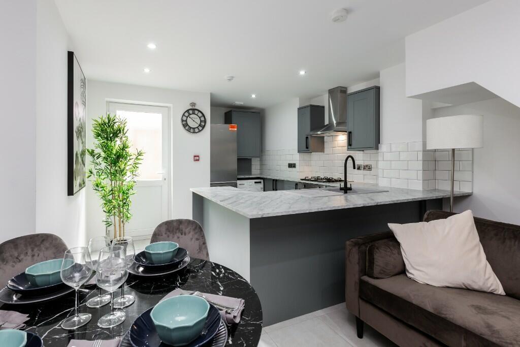 Modern and stylish kitchen with ample counterto...