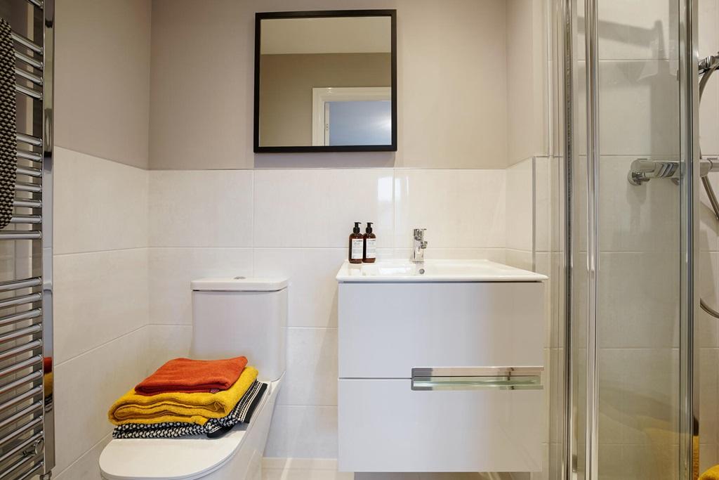 The main bedroom also benefits from it's own en...