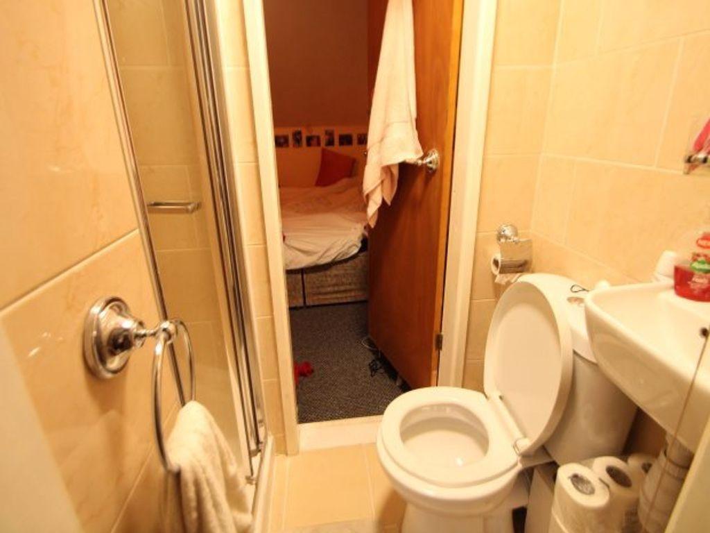 A clean and well-maintained bathroom featuring ...