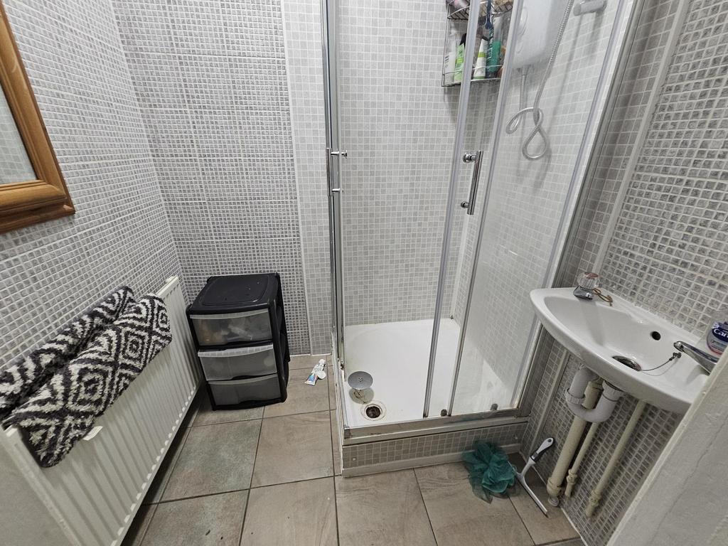A clean and well-maintained bathroom featuring ...
