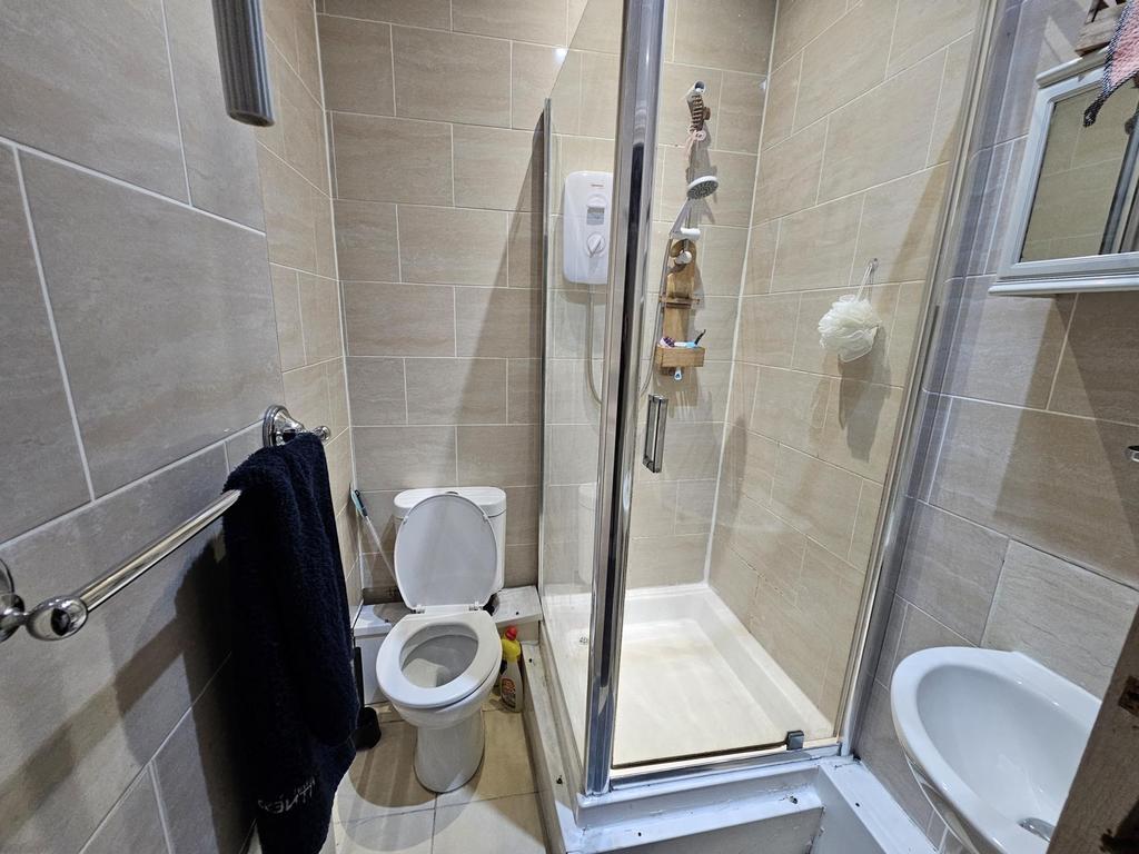 A modern, well-maintained bathroom featuring a ...